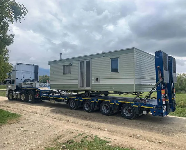 Transportes Diego Luengo casa sobre vehículo